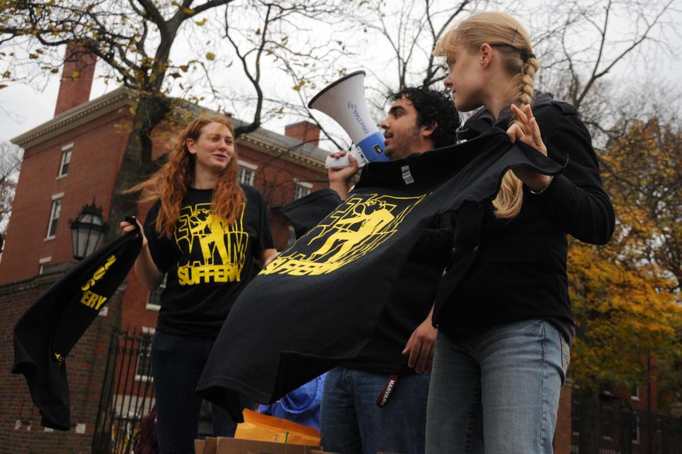 The Harvard University Band enthusiastically sells its shirts, which are based off of LMFAO's "Party Rock Anthem" song.
