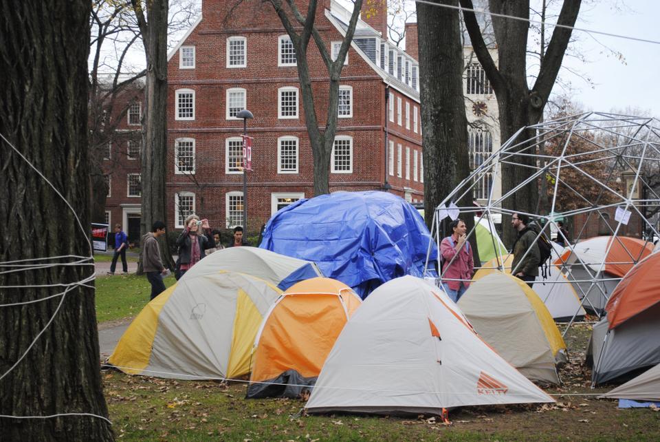 Occupy Harvard protests outside of Mass Hall, where students in 2001 launched a Living Wage campaign. 