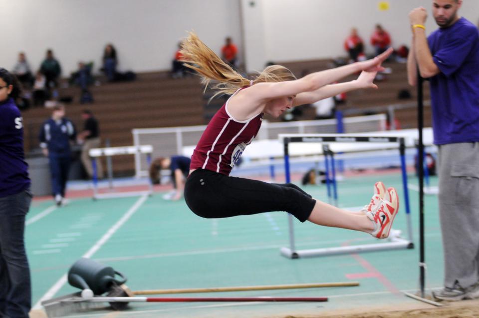 Junior horizontal jumper Olivia Weeks, shown above in previous action, had a weekend to remember, setting a personal-best with her 12.23 meters in the triple jump. Two teammates also set records.