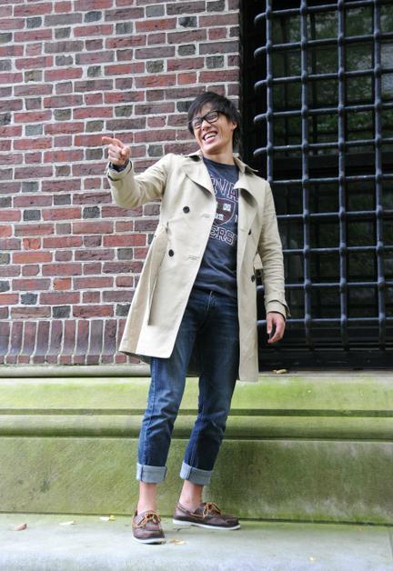 In this file photo taken for a Crimson magazine issue earlier in the semester, Abe Liu poses near Widener Library, showing off his taste of fashion. Liu was apprehended by police on Thursday.