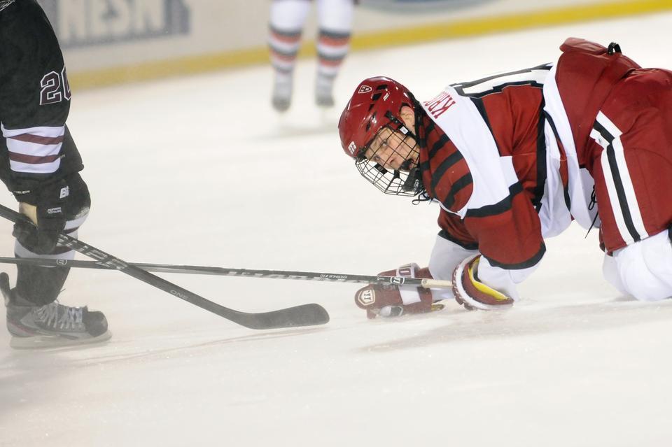 Senior Eric Kroshus ended up on the ice during the Harvard men's hockey team's 2-0 loss to Union Friday night at Fenway Park.