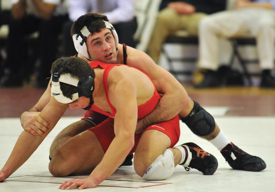 Junior co-captain Walter Peppelman, shown here in earlier action, was one of two Crimson grapplers to record a perfect 3-0 record at Saturday's Lone Star Duals.