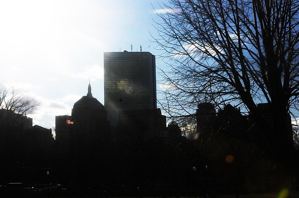 The John Hancock building, one of the tallest in the Boston skyline, is clearly visible from the Boston Common.