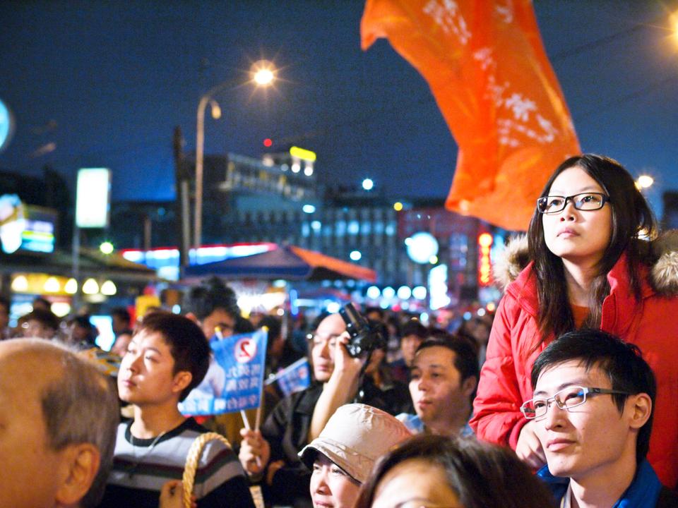 Taiwan presidential incumbent Ma Ying-jeou of the KMT party won reelection on January 15th, 2012.  This photo was taken outside of the KMT headquarters in Taipei in the rain while he gave his victory speech.