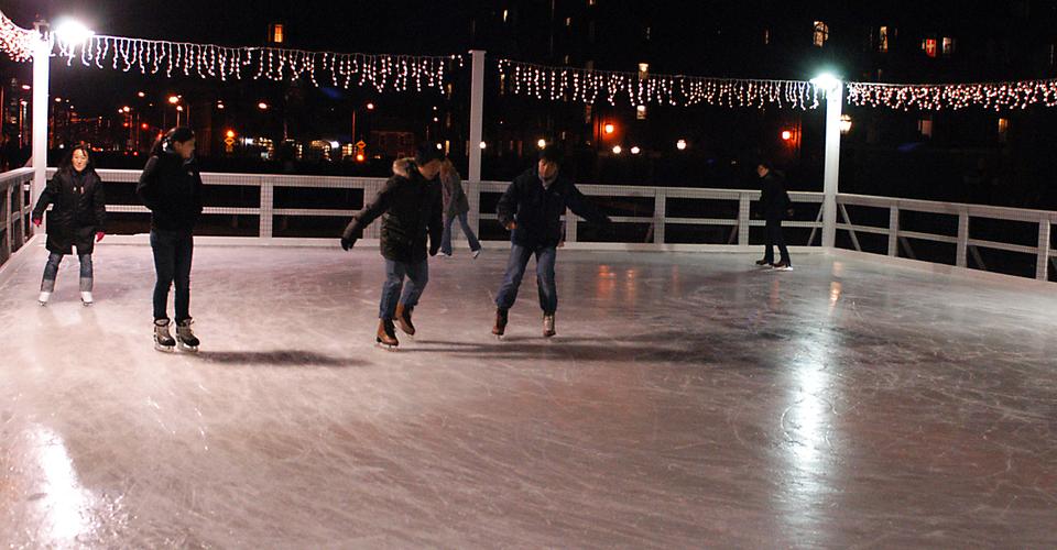 Harvard students and affiliates enjoyed their saturday night ice skating in front of the Science Center in the UC sponsored event.