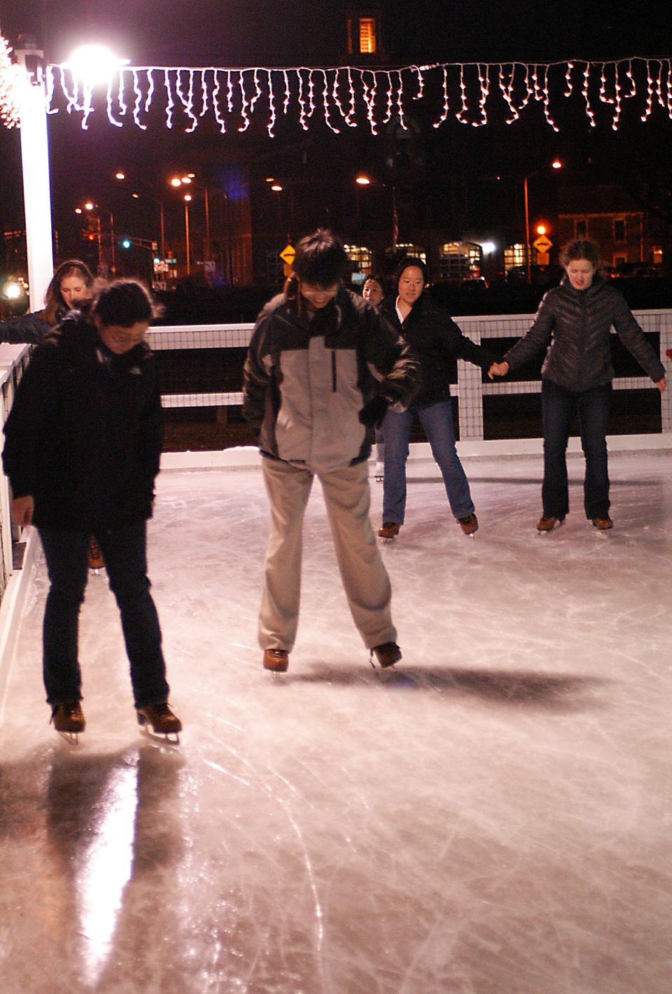 Harvard students and affiliates enjoyed their saturday night ice skating in front of the Science Center in the UC sponsored event.