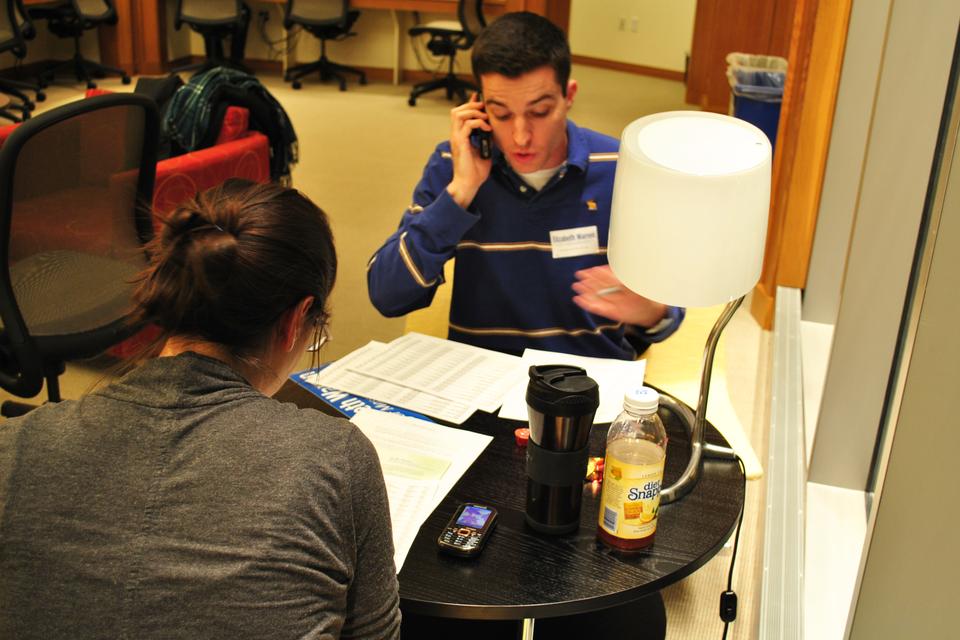 Harvard Law School student-volunteers call registered Massachusetts voters from the Casperson Student Lounge on Sunday night in support of Elizabeth Warren, HLS professor, in her campaign for US Senate.