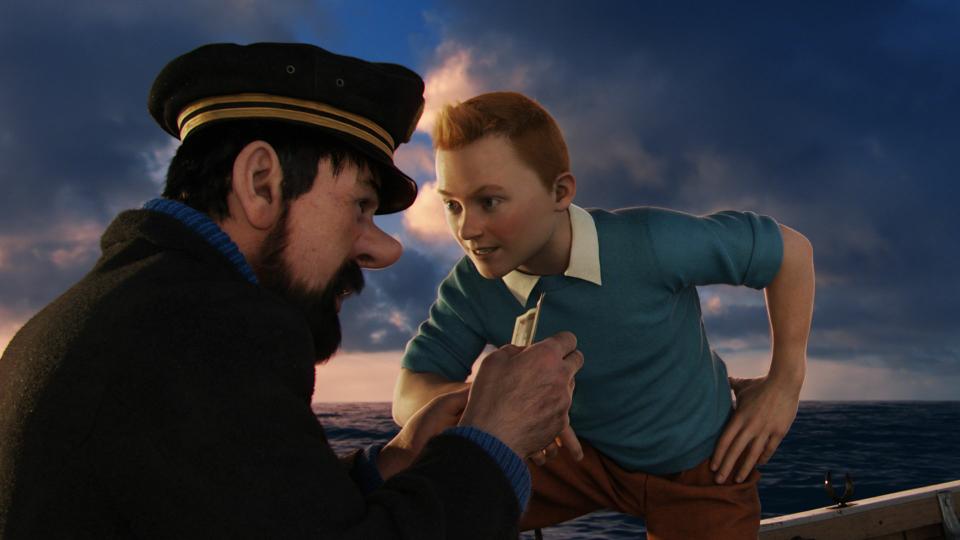 Intrepid young journalist Tintin (voiced by Jamie Bell) and Captain Haddock (Andy Serkis) search for treasure in Steven Spielberg’s new film “The Adventures of Tintin.”