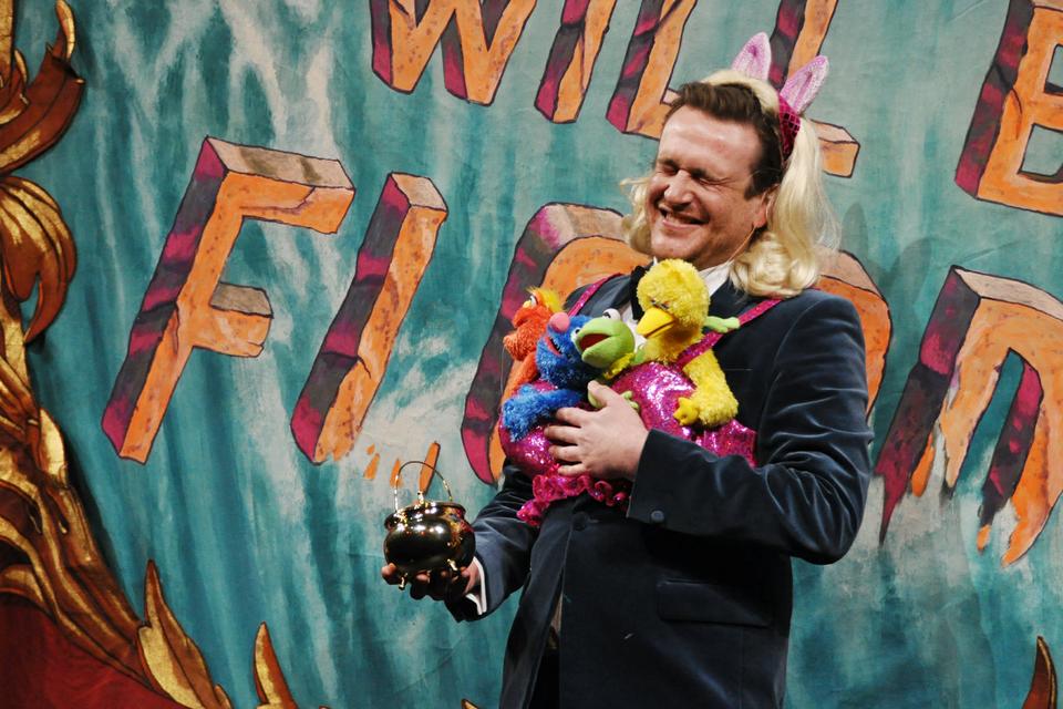 Jason Segel laughs while holding the pudding pot, his award for being the Hasty Pudding Theatricals' Man of the Year, during his thank-you speech last night.  His speech included an advertisement for his family business in Newton, Mass, a clothing store called Mr. Sid.
