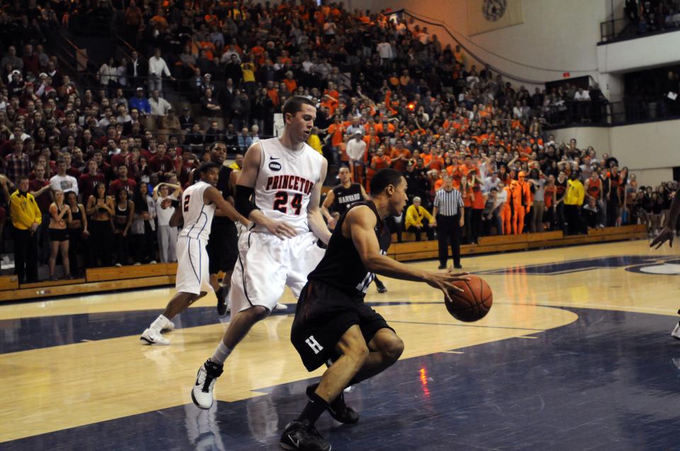 Junior guard Brandyn Curry, shown here in earlier action, will be tasked with shutting down Penn star Zack Rosen this Friday. Harvard faces Princeton on Saturday, and has not swept the two on the road since 1985.