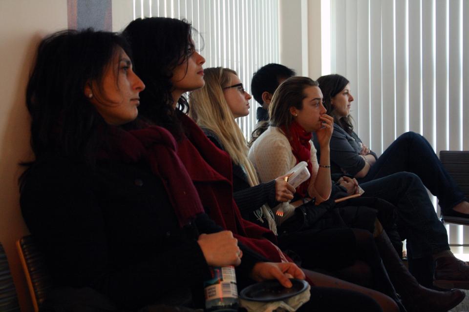 Students watch Miss Representation, a 2011 documentary Jennifer Siebel Newsom and featuring Margaret Cho and Katie Couric, at an event sponsored by the Harvard Kennedy School's Women and Public Policy initiative.