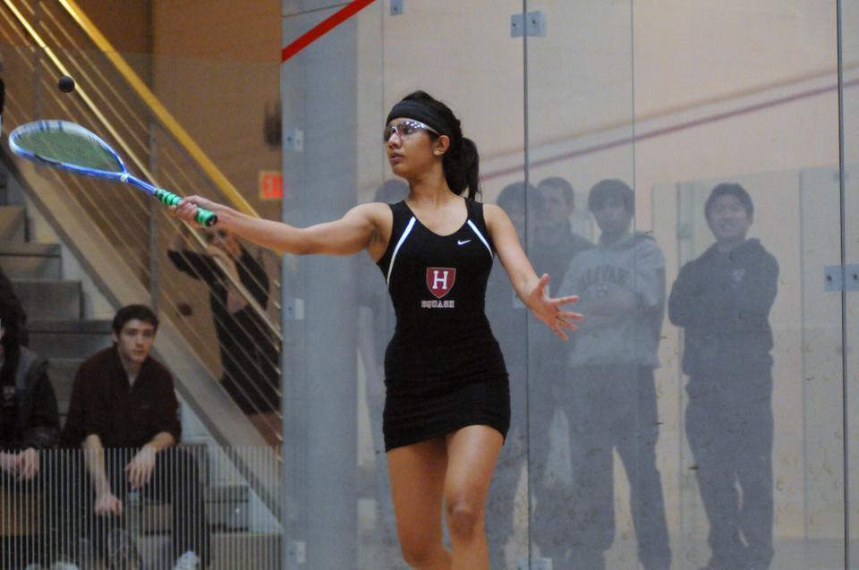 In her final regular season match, Harvard co-captain Nirasha Guruge, shown above in earlier action, defeated Yale co-captain Rhetta Nadas in four games, battling back from an early one-game deficit to grab the win. Guruge was one of five Crimson players to grab victories on Sunday.