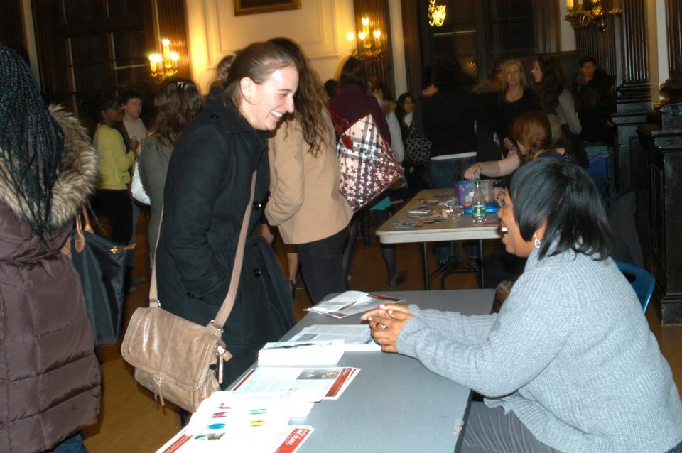 Friday night Keri Hartman '12 speaks with a representative of the My Life My Choice project at a reception following The Vagina Monologues. 