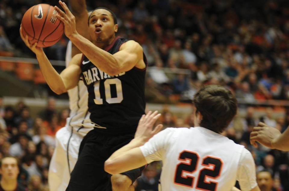Junior point guard Brandyn Curry, shown here in earlier action, scored 18 points and dished out five assists, both team highs, to lead the Harvard men's basketball team to a 66-51 win over Yale.