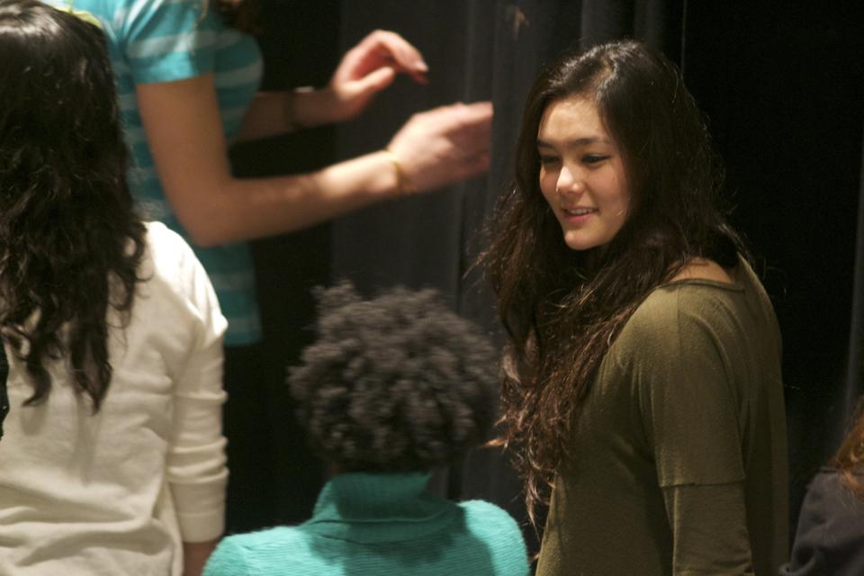 Li Murphy '15 turns to talk to one of her fellow Vagina Monologues participant as the cast exits the stage.