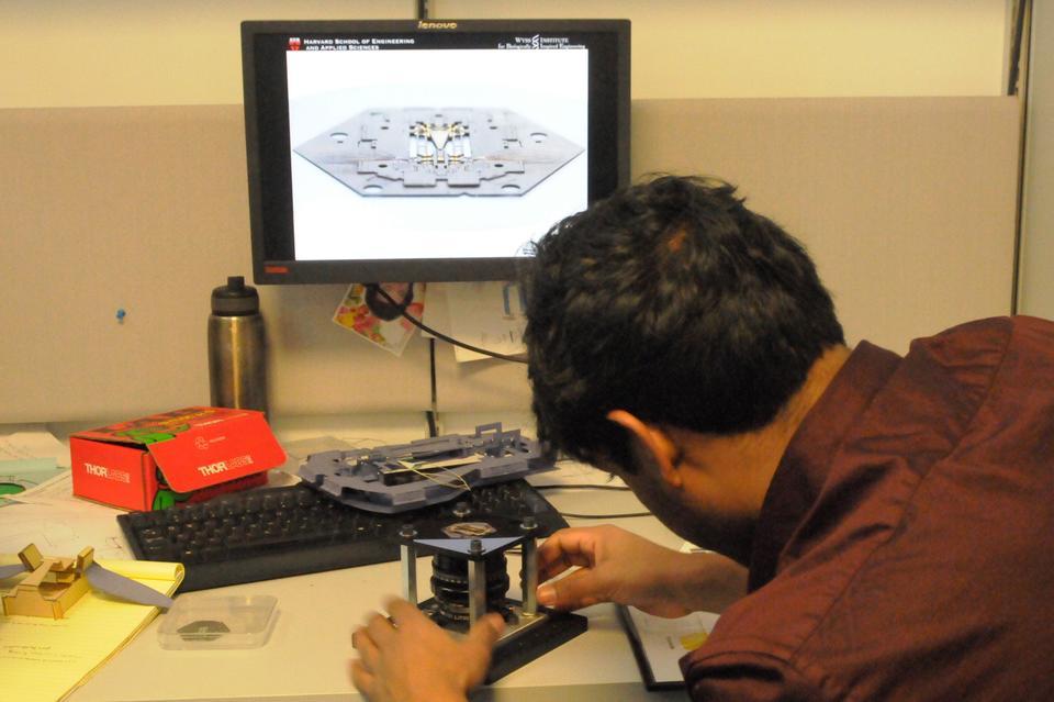 On Friday, Harvard graduate student Pratheev S. Sreetharan demonstrates how the robotic fly works when it is cranked manually. He hopes to explore all of the implications of his breakthrough. 