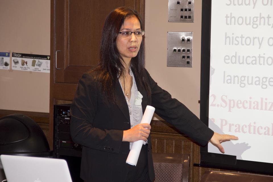 Dr. Oanh Ngo is giving a presenentation about legal education in her country, Vietnam. Vietnam's number of educated lawyers are relatively low compared to other countries