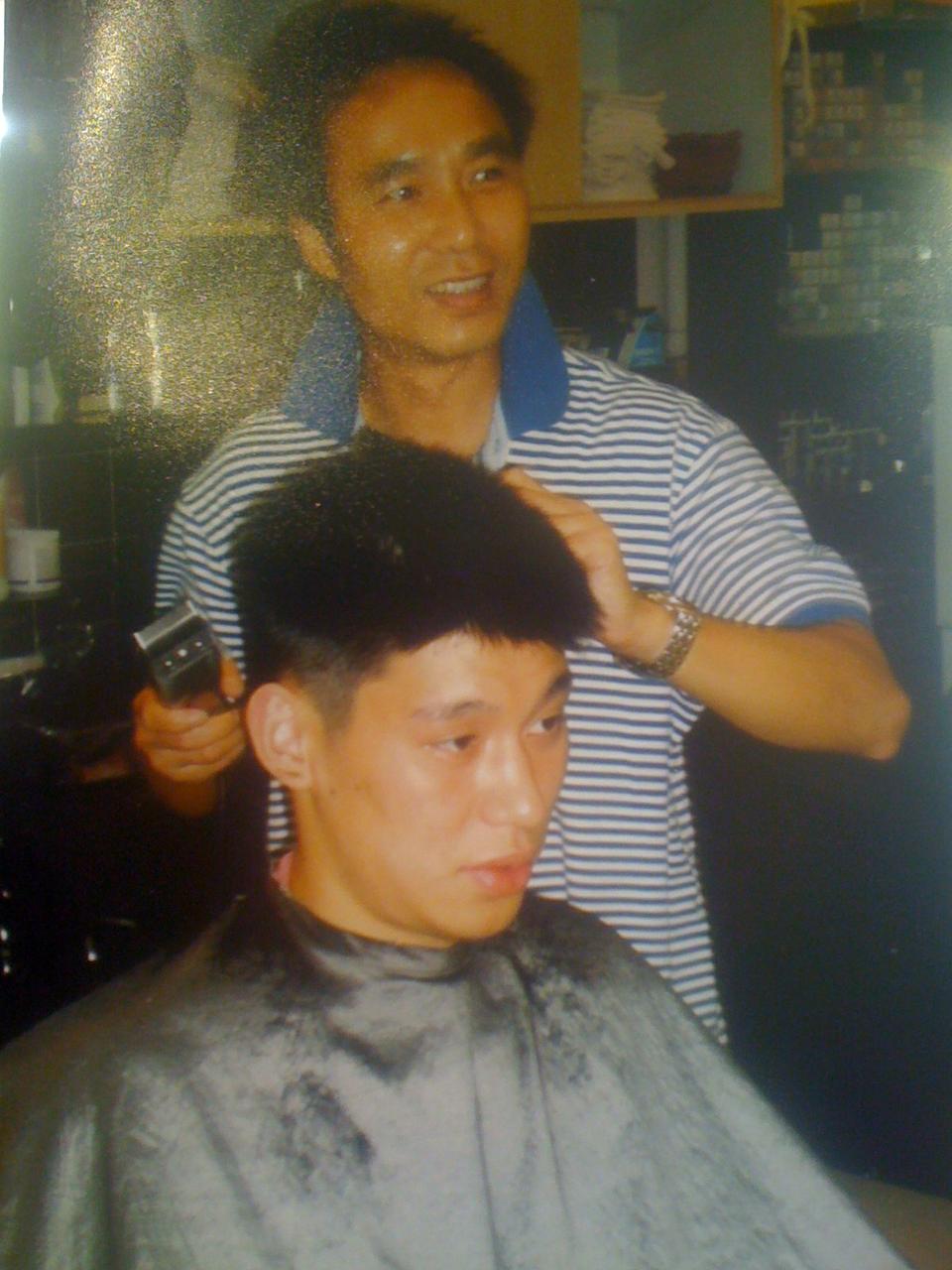 Framed photograph of Jeremy Lin and his barber Jimmy.