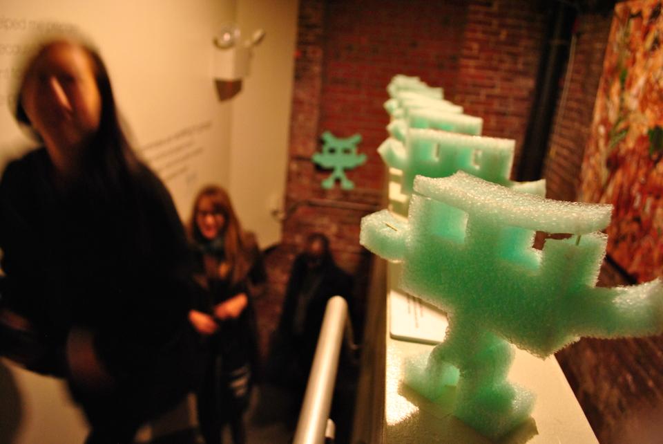 Participants in “Experience Economies 6: Innovate or Die” climb stairs at the Idea Translation Lab @ Cloud Place, an innovation studio in Copley Square, to take the bizarre ARE test.