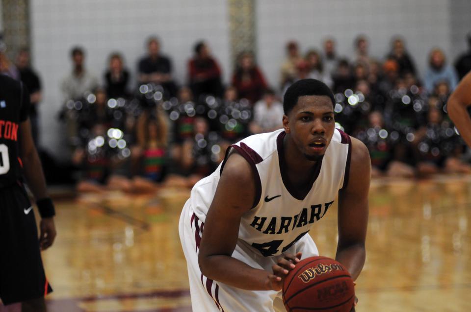 Co-captain Keith Wright and the Harvard men’s basketball team will play in the NCAA Tournament next weekend.