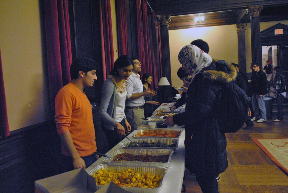 Students gather in Winthrop JCR for the Harvard for Pakistan banquet fundraiser. They are working to respond to the devastating floods in Pakistan in 2010-2011 with humanitarian aid. They ultimately raised $1400 at the end of the night. 