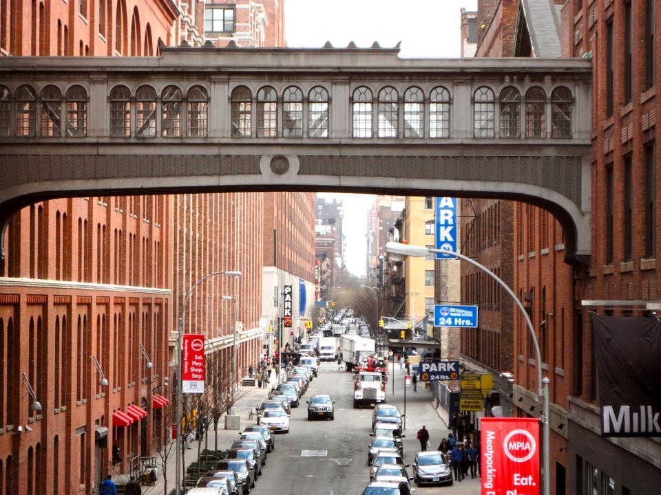 A cursory survey of bridges of sighs yields:

1. Between Allegheny County Court House and Prison, Pittsburgh, Pa.
 2. At Hertford College, Oxford, U.K.
 3. Between Old and New Courts of St. John’s College, Cambridge, U.K.
4. Connecting the Tombs and Criminal Court Building, N.Y.
 5. Between prisons and interrogation rooms in the Doge’s Palace, Venice, Italy
 
And then, a sixth. James Torrance is no Lord Byron—he didn’t name the bridge, just designed it. But there’s something poetic in the fact that his bridge connects Chelsea Market—the former headquarters of cookie-mogul Nabisco—with an photography studio called Milk.