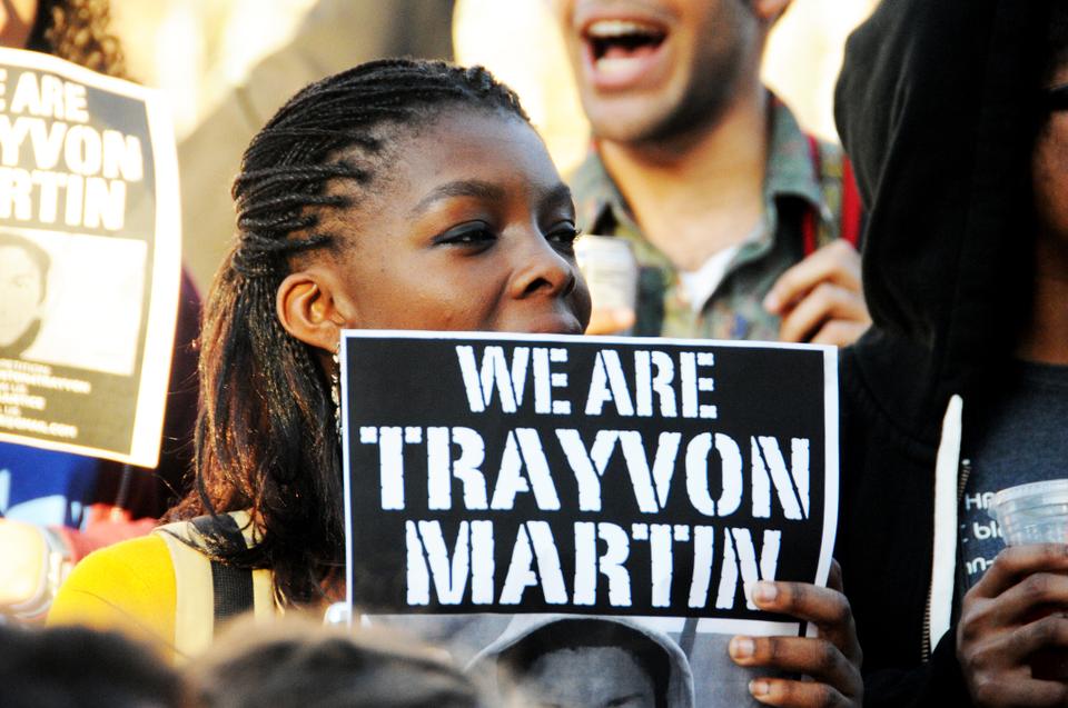 Harvard students and residents of the Boston area convene near the Harvard Square T Stop on Wednesday evening, protesting the unwarranted killing of 17-year old Trayvon Martin.