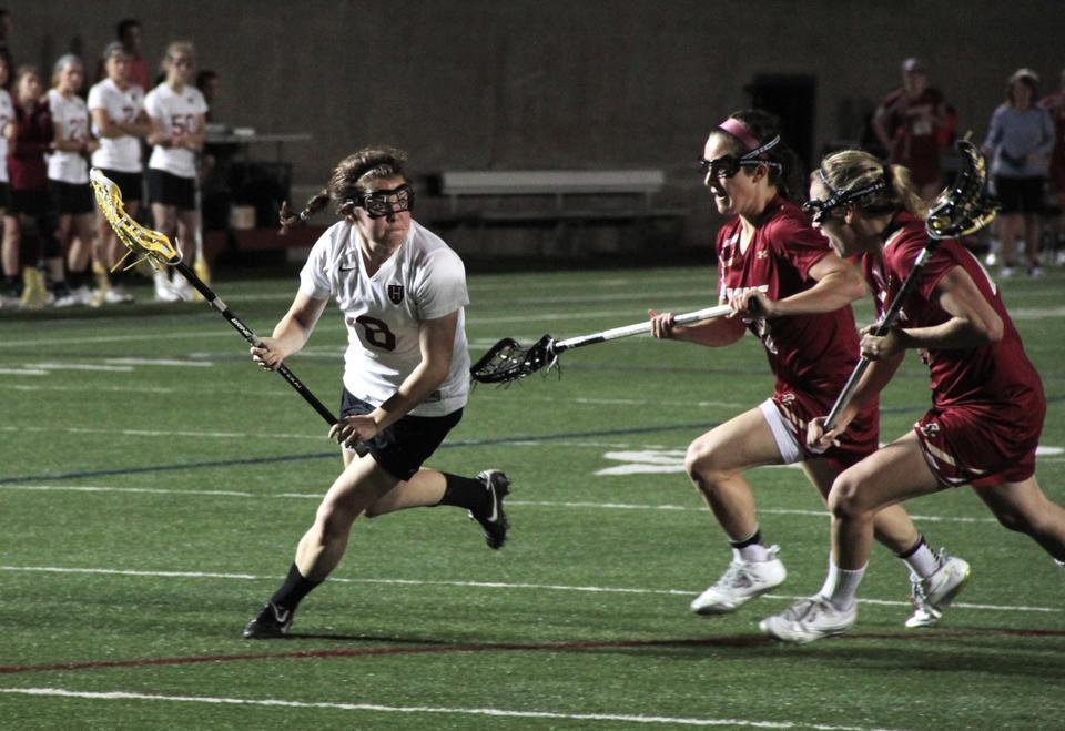 Co-captain Melanie Baskind, shown above in earlier action, led the Harvard women’s lacrosse team to a 7-5 win at Yale on Saturday afternoon, notching two goals, two ground balls, and a draw control. The win snapped the Crimson’s three-game losing streak and moved the squad to 1-2 in Ivy play.