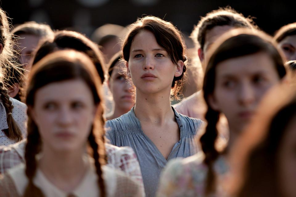 Jennifer Lawrence plays the role of Katniss Everdeen, the star of “The Hunger Games,” which premiered this past weekend and has taken the #1 grossing spot of US movies.