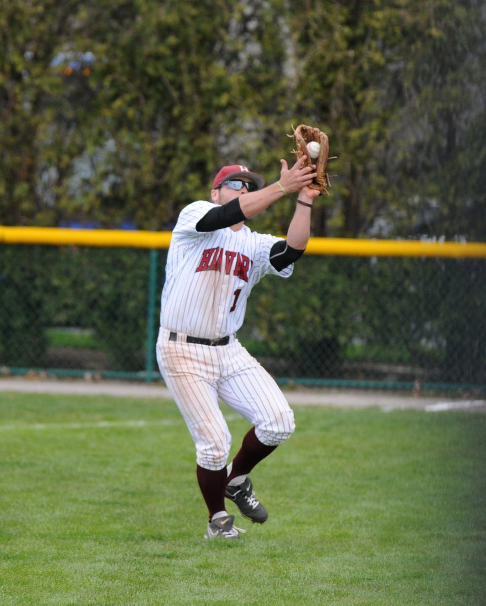 Junior outfielder J.T. Tomes makes the catch in the Harvard baseball team's Saturday doubleheader against Columbia. The Crimson took game one, only Harvard's fifth win of the season, before falling to the Lions in the second contest.