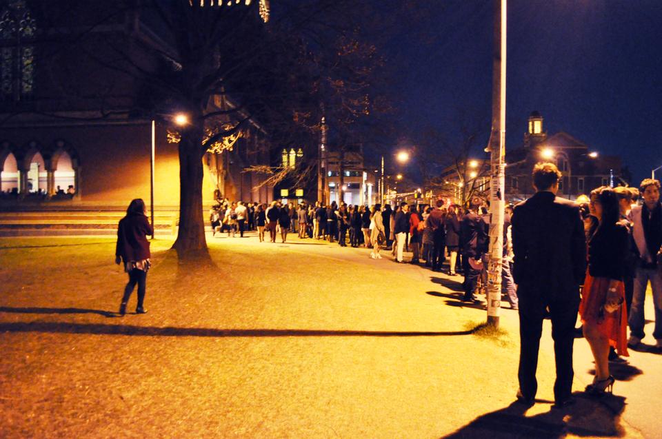 Hundreds of students line up in chilly temperatures to get into Annenberg Hall for Identities 2012, a fashion show to raise awareness of the intellectual and cultural significance of fashion in the Harvard community, on Saturday, April 7. 