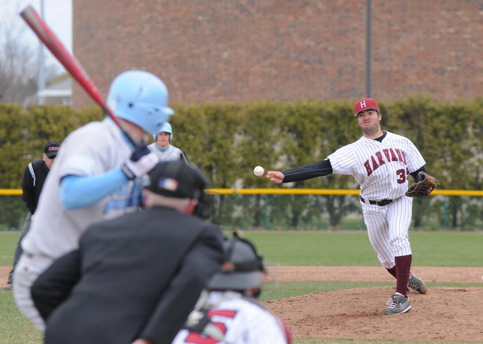 Junior Zack Olson fires toward home in the Harvard baseball team's 6-2 victory over Columbia on Saturday afternoon. Olson was credited with the save, his second of the season. Though the Crimson took the first game of the doubleheader, Harvard couldn't manage the sweep and fell in game two, 10-1.