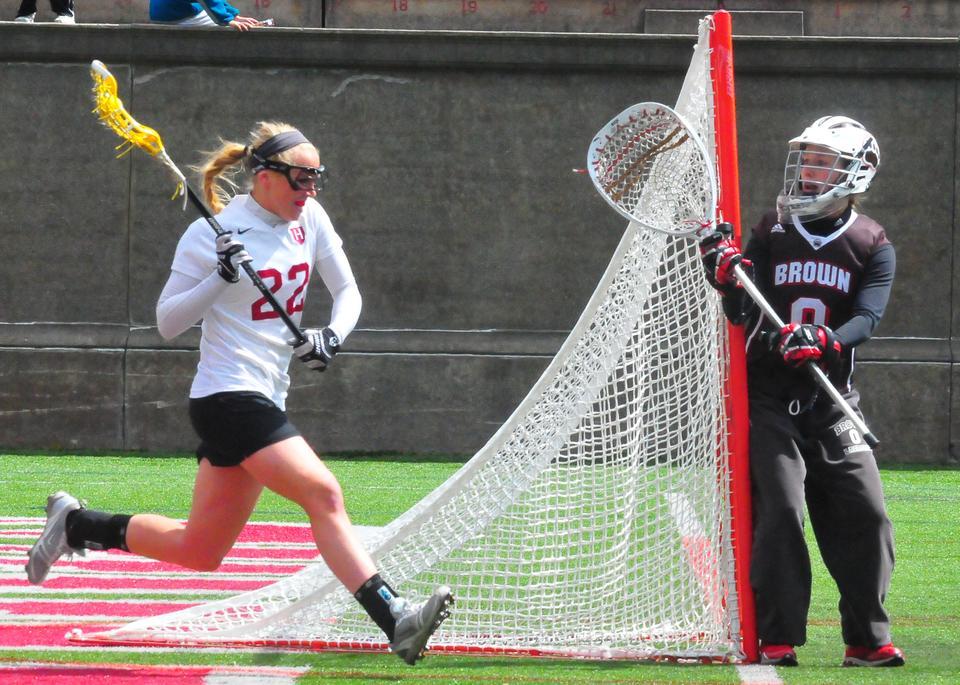 Sophomore midfielder Kyleigh Keating drives to the goal during the Harvard women’s lacrosse team’s 16-8 victory over Brown at Harvard Stadium on Saturday. Keating finished with two goals and an assist and won a career-high six draw controls.  