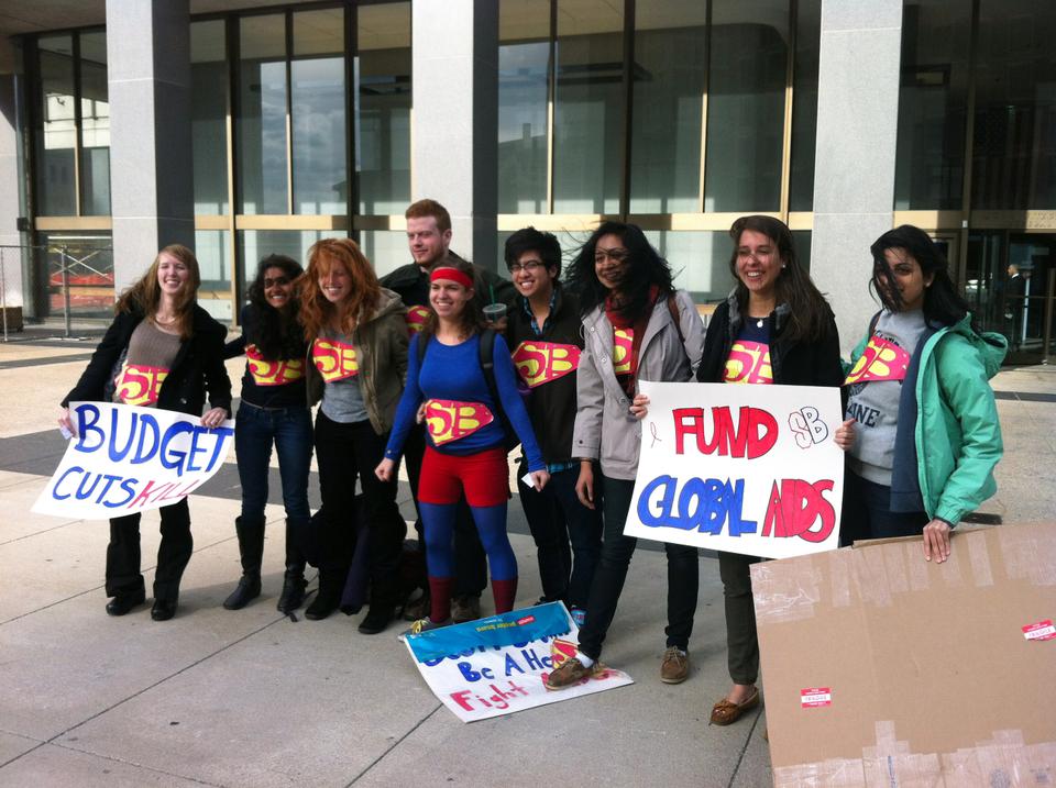 Students from the Harvard Global Health and AIDS Coalition pose outside of Scott Brown’s office after urging him to endorse an effort to block proposed funding cuts to the President’s Emergency Plan for AIDS Relief. 