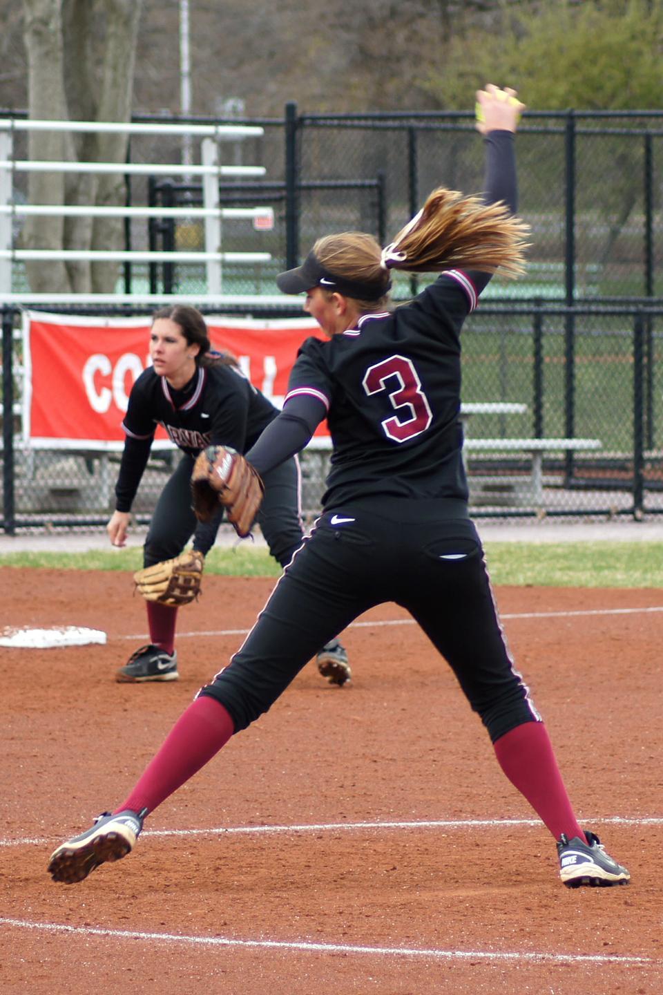 Co-captain pitcher Rachel Brown, shown here in earlier action, fanned 14 batters on the way to a 6-2 win in the first of two games at URI. 