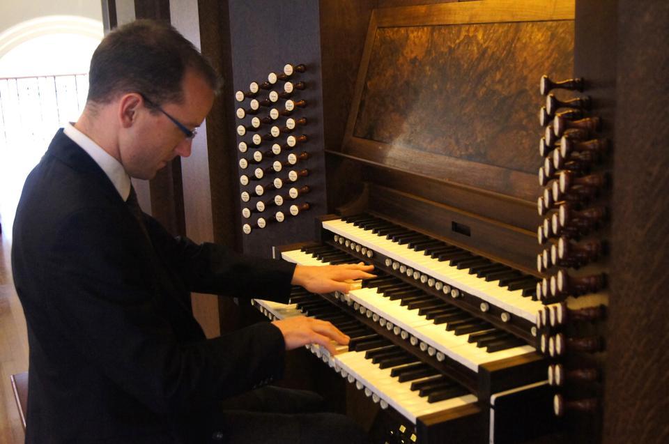 Assistant University Organist and Choirmaster and musician Christian M. Lane performs on the new pipe organ at Memorial Church, which was debuted to the public on Sunday, April 8. 