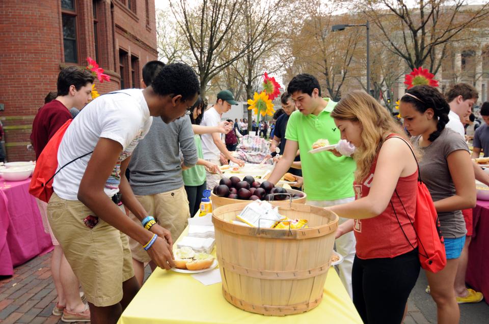 Students enjoy a HUDS-sponsored meal outside before and during the performances. In addition to the typical barbeque fare, cotton candy and ice cream were also served. 