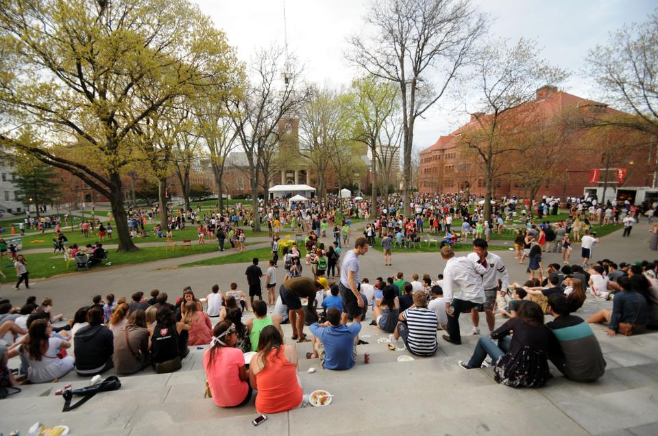 Students gather on the steps of Widener to eat, socialize, and soak up the atmosphere overlooking Yardfest and Tercentenary Theater. 