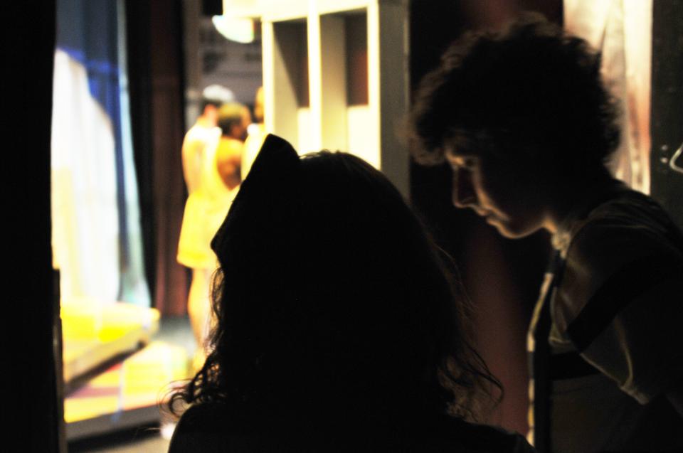Zoey A. Bergstrom '15 and Alex B. Miller '15 wait to enter onto the stage. They play the teleporting twin monks-in-training, Foma and Moma. The two meet many characters as they work to restore order and peace to the world.