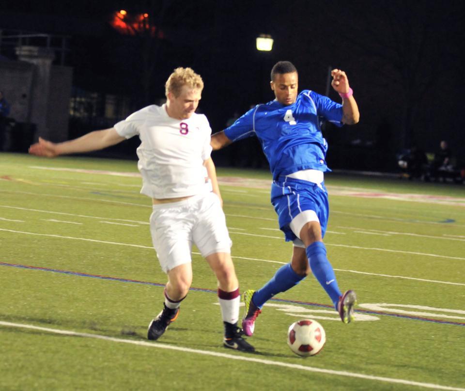 Sophomore forward Connor McCarthy tries to corral the ball during the Harvard men’s soccer team’s exhibition matchup with the Cape Verde All-Star Team on Friday night at Harvard Stadium. The Crimson fell in penalty kicks, 7-6, after the teams were knotted, 1-1, at the end of regulation. Junior Zack Wolfenzon scored for the Crimson.