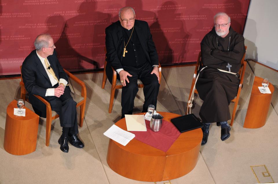 From left, moderator Jorge Domínguez, Cardinal Jaime Lucas Ortega y Alamino, and Cardinal Seán Patrick O’Malley discuss Catholicism and Pope Benedict XVI’s March visit to Cuba at the IOP Forum on Wednesday. 