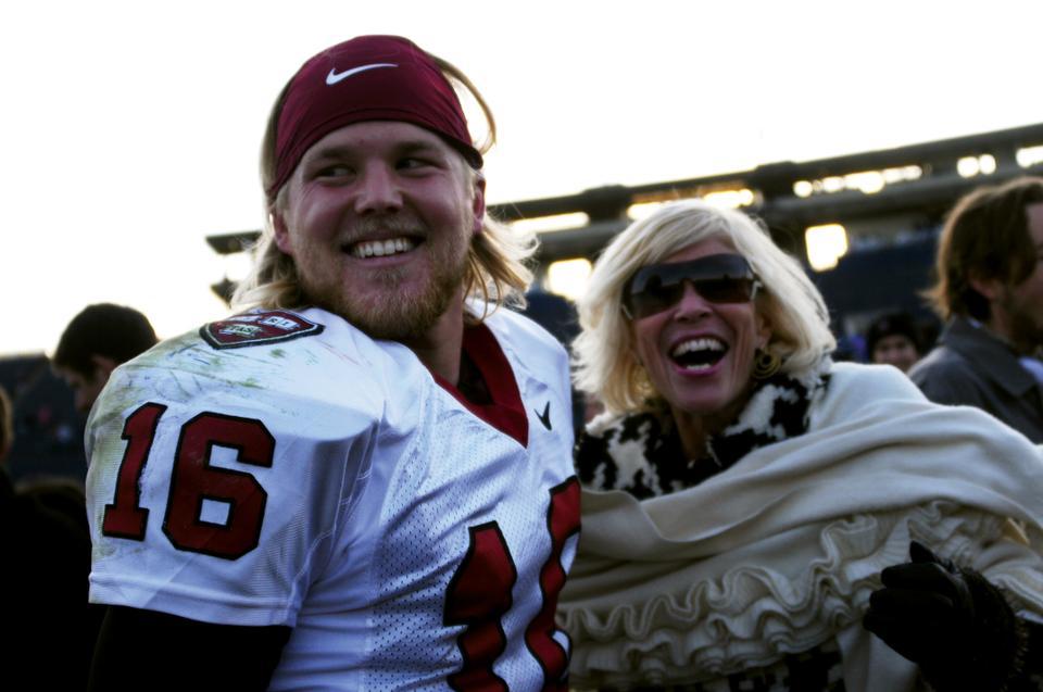 Quarterback Collier Winters, pictured above after leading Harvard to a resounding win in his final collegiate game, now has his sights set on playing football professionally. Winters hopes to play in either the NFL or the CFL.