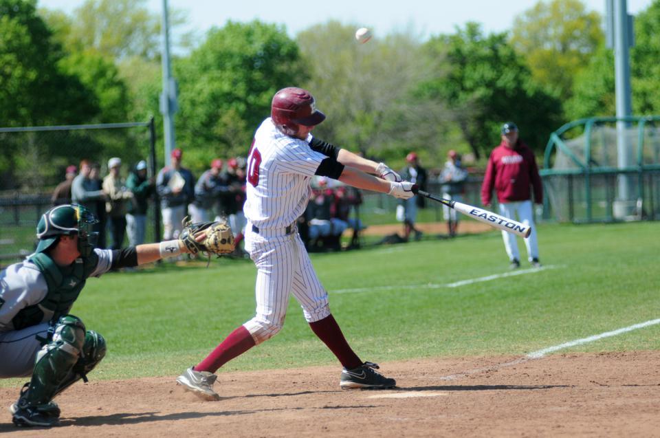 Sophomore Jake McGuiggan takes a hack during the baseball team’s first of two losses to Dartmouth on Saturday. The shortstop went 2-for-8 on the day, scoring a run in the opener, an 11-3 defeat. The back-to-back losses eliminated the Crimson from postseason contention. 