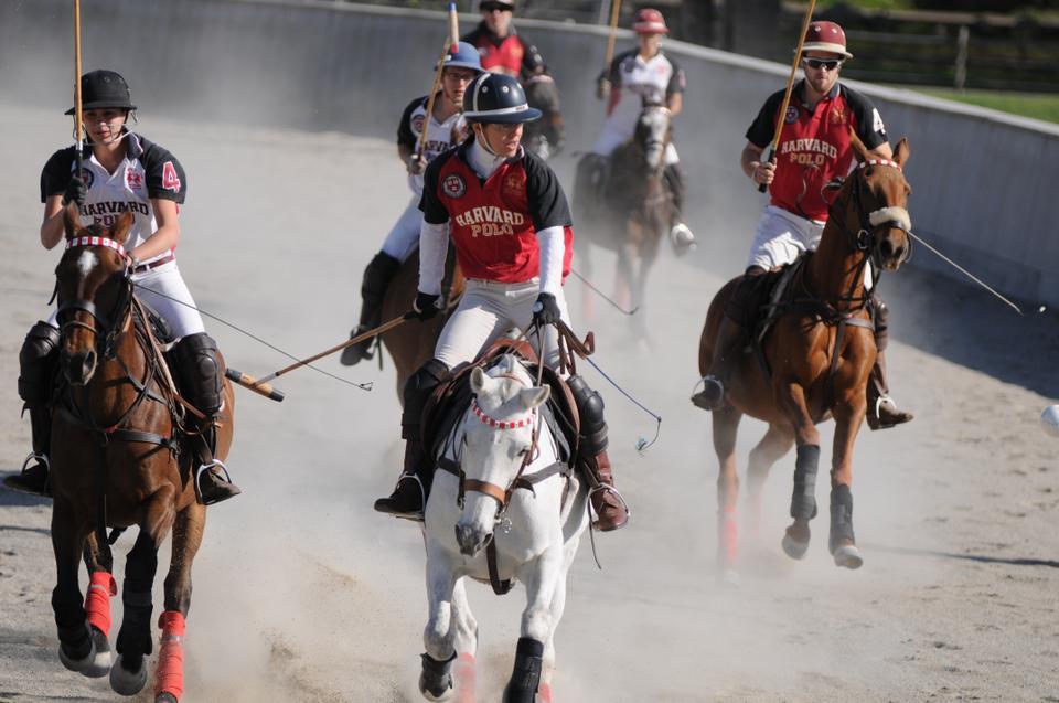 Dawn Jones, wife of Tommy Lee Jones '69, leads the alumni in the third chukker comeback against the senior team. This past year, Jones won the U.S. Women's Open in polo.