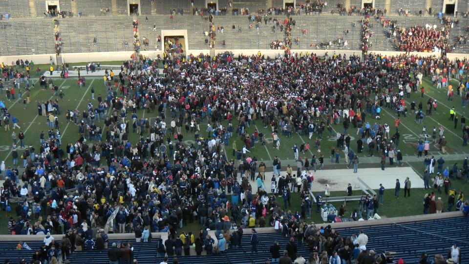 Fans storm the field to celebrate 2011's installment of The Game, just one of the many contests for which NBC Sports Network has newly negotiated broadcast rights.