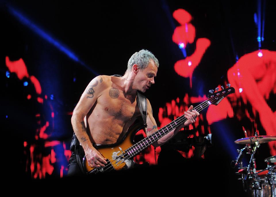 Flea plays the bass at the Red Hot Chili Peppers concert Monday night at TD Gardens. The concert attracted a wide variety of audience members, including some super fans who had been traveling on train since 3pm to attend the concert that night.