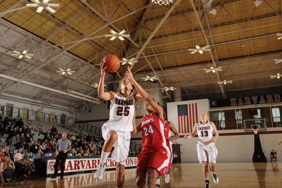 Harvard junior Miriam Rutzen drives to the basket during the women’s basketball team’s 63-56 victory over St. Johns. The win marked the Crimson’s first victory over a Big East opponent since 2003.