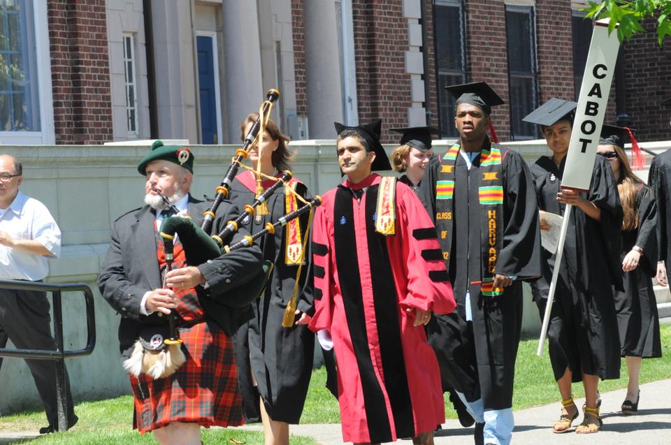 The Cabot Class of 2012 processes back to their House at Commencement 2012, led by a bagpipe player and their House Masters, Rakesh and Stephanie Khurana.