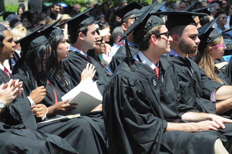 Cabot Seniors wait to receive their diplomas on the Quad Lawn on Thursday afternoon