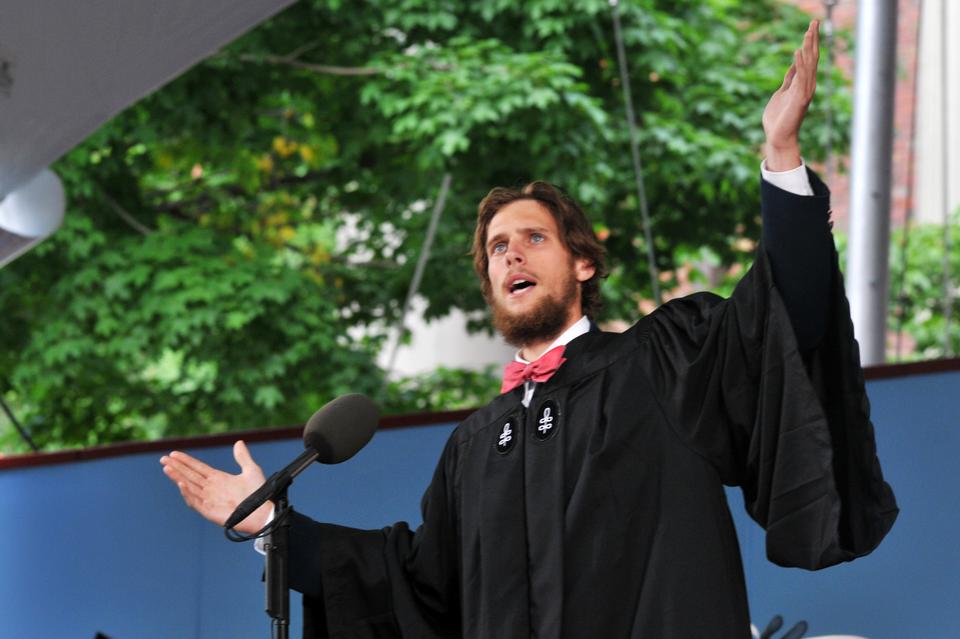 Michael K. Velchik, graduating senior from Dunster House, delivers an animated Latin Salutatory at Harvard's 361st Commencement on Thursday morning in Tercentary Theatre.